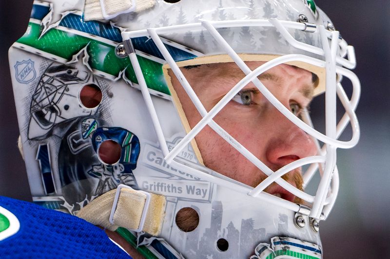 Apr 16, 2024; Vancouver, British Columbia, CAN; Vancouver Canucks goalie Thatcher Demko (35) during a stop in play against the Calgary Flames in the second period at Rogers Arena. Mandatory Credit: Bob Frid-USA TODAY Sports