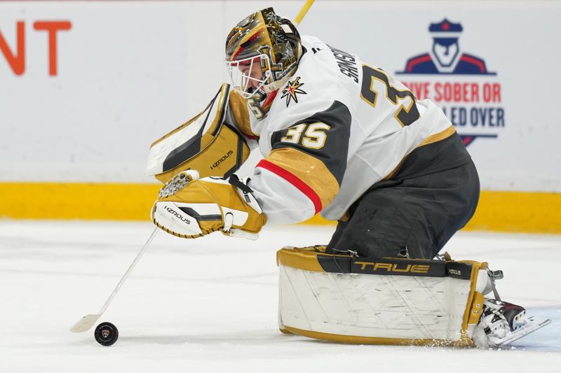 Oct 19, 2024; Sunrise, Florida, USA;  Vegas Golden Knights goaltender Ilya Samsonov (35) makes a save against the Florida Panthers during the second period at Amerant Bank Arena. Mandatory Credit: Jim Rassol-Imagn Images