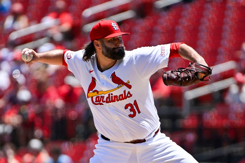 Jun 13, 2024; St. Louis, Missouri, USA;  St. Louis Cardinals starting pitcher Lance Lynn (31) pitches against the Pittsburgh Pirates during the first inning at Busch Stadium. Mandatory Credit: Jeff Curry-USA TODAY Sports