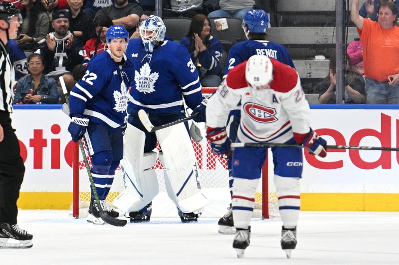 Sep 26, 2024; Toronto, Ontario, CAN;  Toronto Maple Leafs defenseman Jake McCabe (22) greets goalie Anthony Stolarz (41) after a win over the Montreal Canadiens at Scotiabank Arena. Mandatory Credit: Dan Hamilton-Imagn Images