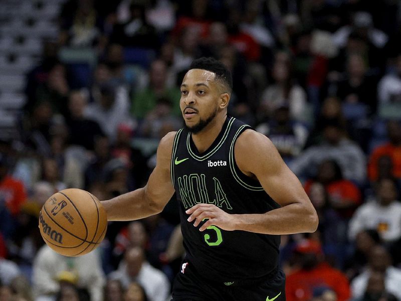 NEW ORLEANS, LOUISIANA - JANUARY 23: CJ McCollum #3 of the New Orleans Pelicans dribbles the ball down court during the third quarter of an NBA game against the Utah Jazz at Smoothie King Center on January 23, 2024 in New Orleans, Louisiana. NOTE TO USER: User expressly acknowledges and agrees that, by downloading and or using this photograph, User is consenting to the terms and conditions of the Getty Images License Agreement. (Photo by Sean Gardner/Getty Images)