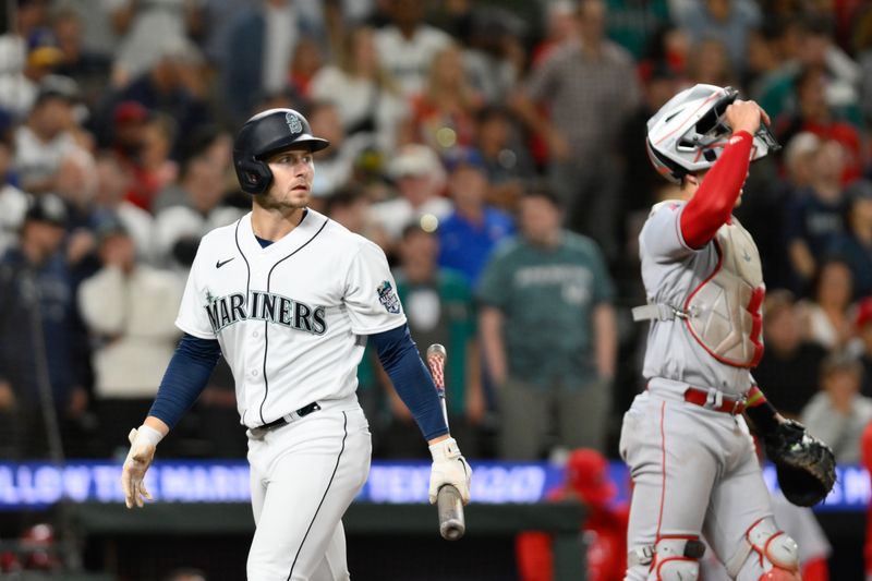 Sep 11, 2023; Seattle, Washington, USA; Seattle Mariners right fielder Jarred Kelenic (10) walks off the field after striking out to the Los Angeles Angels during the ninth inning at T-Mobile Park. Mandatory Credit: Steven Bisig-USA TODAY Sports