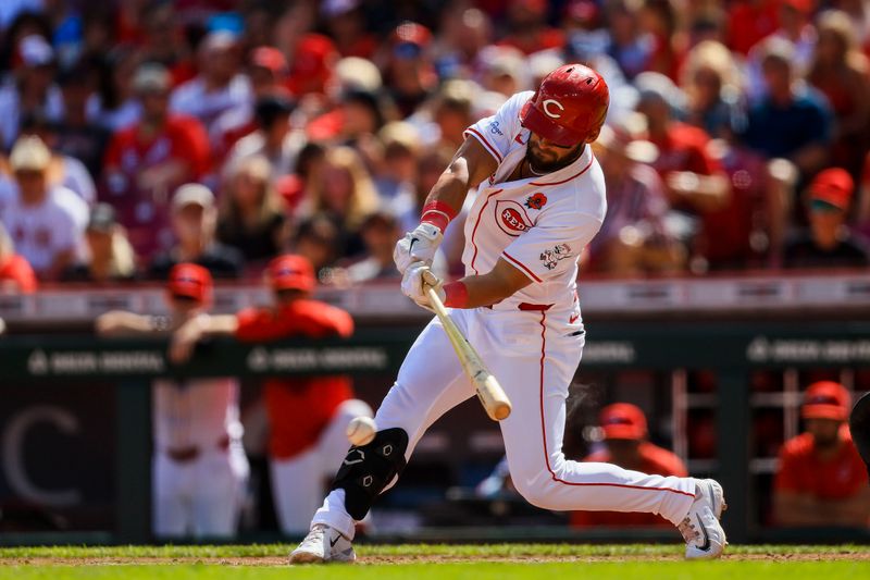 May 27, 2024; Cincinnati, Ohio, USA; Cincinnati Reds designated hitter Nick Martini (23) hits a single against the St. Louis Cardinals in the second inning at Great American Ball Park. Mandatory Credit: Katie Stratman-USA TODAY Sports