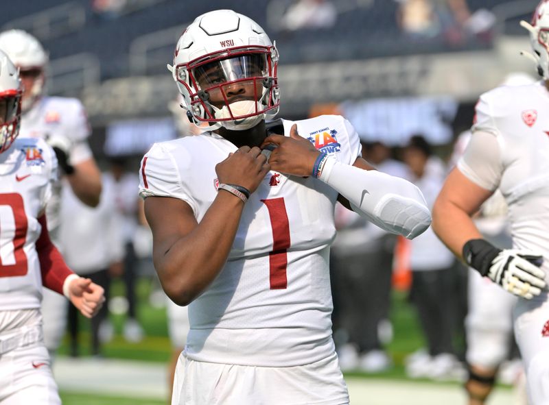 Dec 17, 2022; Inglewood, CA, USA;  Washington State Cougars quarterback Cameron Ward (1) warms up prior to the game against the Fresno State Bulldogs at SoFi Stadium. Mandatory Credit: Jayne Kamin-Oncea-USA TODAY Sports