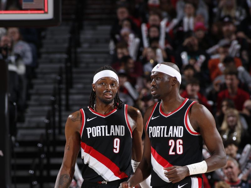 PORTLAND, OR - JANUARY 28: Jerami Grant #9 talks with Duop Reath #26 of the Portland Trail Blazers during the game against the Chicago Bulls on January 28, 2024 at the Moda Center Arena in Portland, Oregon. NOTE TO USER: User expressly acknowledges and agrees that, by downloading and or using this photograph, user is consenting to the terms and conditions of the Getty Images License Agreement. Mandatory Copyright Notice: Copyright 2024 NBAE (Photo by Cameron Browne/NBAE via Getty Images)