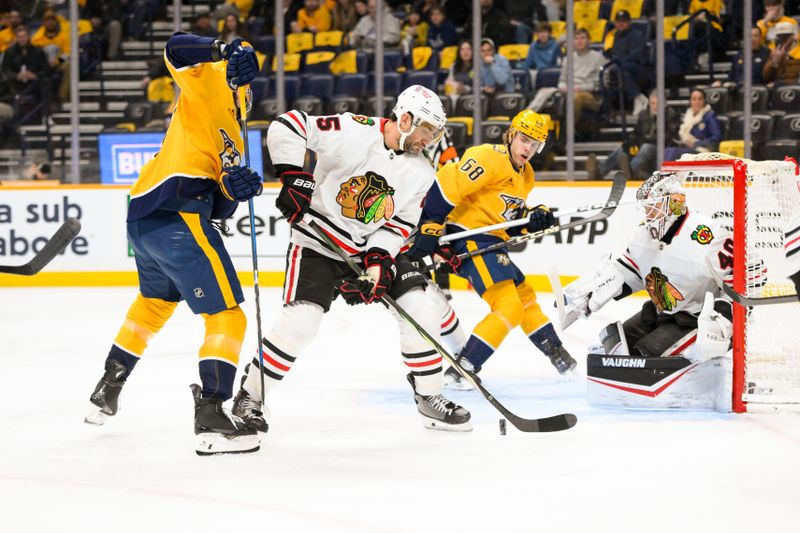 Jan 16, 2025; Nashville, Tennessee, USA;  Chicago Blackhawks defenseman Alec Martinez (25) cp against the Nashville Predators during the first period at Bridgestone Arena. Mandatory Credit: Steve Roberts-Imagn Images