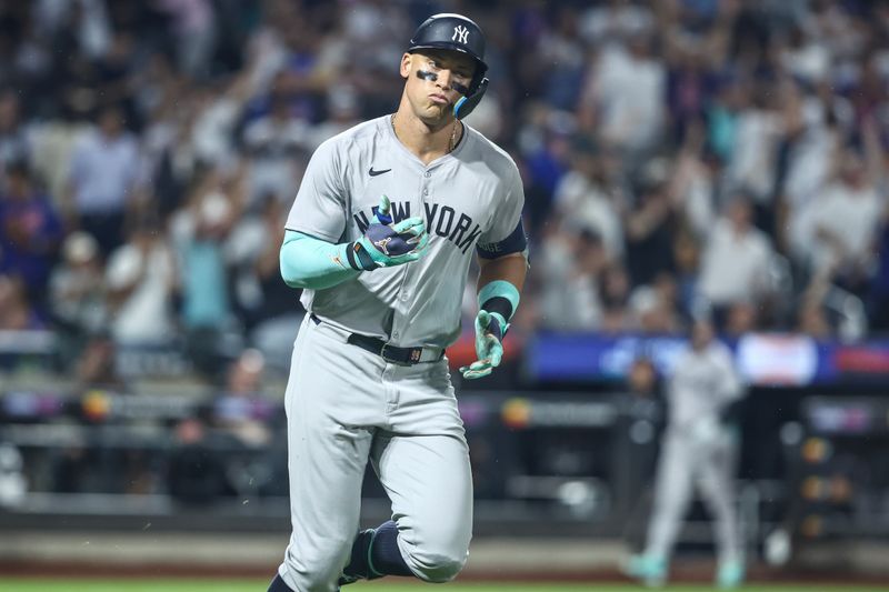 Jun 26, 2024; New York City, New York, USA;  New York Yankees center fielder Aaron Judge (99) reacts after hitting a two run home run in the sixth inning against the New York Mets at Citi Field. Mandatory Credit: Wendell Cruz-USA TODAY Sports