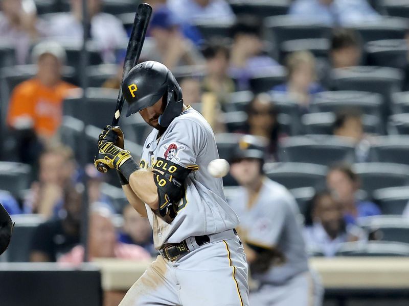 Aug 15, 2023; New York City, New York, USA; Pittsburgh Pirates second baseman Jared Triolo (19) is hit by a pitch to drive in a run during the seventh inning against the New York Mets at Citi Field. Mandatory Credit: Brad Penner-USA TODAY Sports