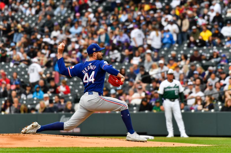 May 11, 2024; Denver, Colorado, USA; Texas Rangers pitcher Andrew Heaney (44) delivers against the Colorado Rockies during the first inning at Coors Field. Mandatory Credit: John Leyba-USA TODAY Sports