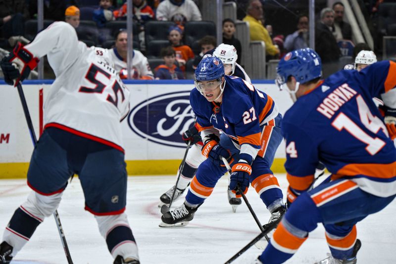 Dec 7, 2023; Elmont, New York, USA; New York Islanders left wing Anders Lee (27) skates with the puck as Columbus Blue Jackets defenseman David Jiricek (55) defends during the second period at UBS Arena. Mandatory Credit: John Jones-USA TODAY Sports