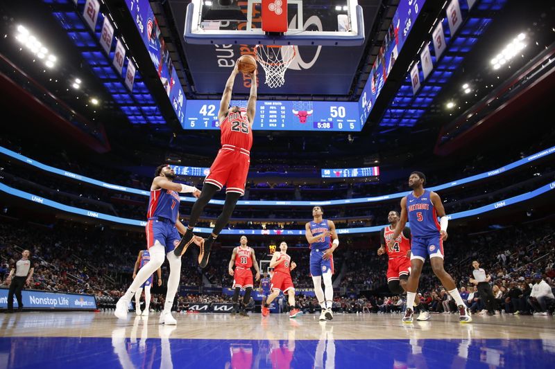 DETROIT, MI - APRIL 11: Dalen Terry #25 of the Chicago Bulls dunks the ball during the game against the Detroit Pistons on April 11, 2024 at Little Caesars Arena in Detroit, Michigan. NOTE TO USER: User expressly acknowledges and agrees that, by downloading and/or using this photograph, User is consenting to the terms and conditions of the Getty Images License Agreement. Mandatory Copyright Notice: Copyright 2024 NBAE (Photo by Brian Sevald/NBAE via Getty Images)