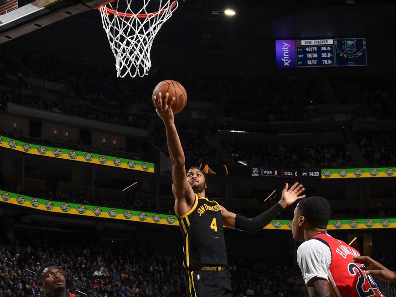 SAN FRANCISCO, CA - JANUARY 10:  Moses Moody #4 of the Golden State Warriors goes to the basket during the game on January 10, 2024 at Chase Center in San Francisco, California. NOTE TO USER: User expressly acknowledges and agrees that, by downloading and or using this photograph, user is consenting to the terms and conditions of Getty Images License Agreement. Mandatory Copyright Notice: Copyright 2024 NBAE (Photo by Noah Graham/NBAE via Getty Images)