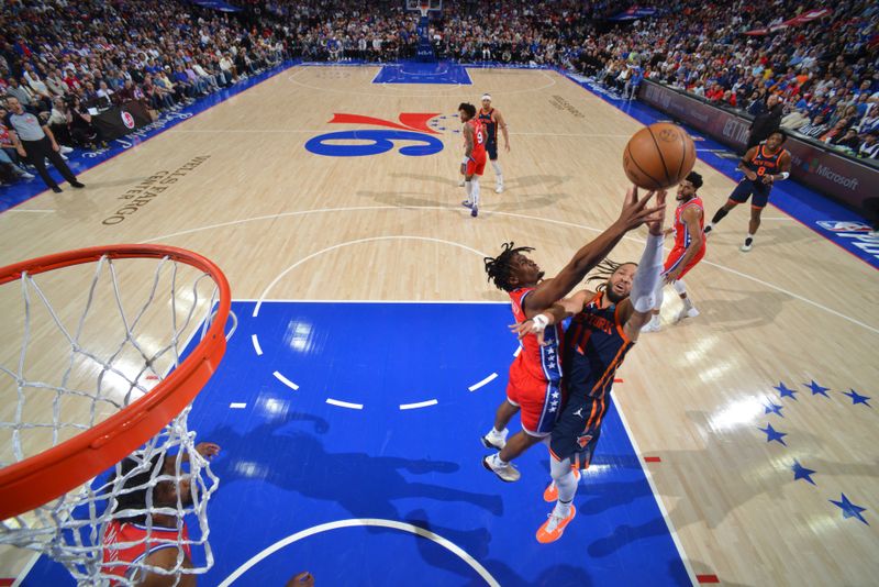 PHILADELPHIA, PA - APRIL 28: Jalen Brunson #11 of the New York Knicks shoots the ball during the game against the Philadelphia 76ers during Round 1 Game 4 of the 2024 NBA Playoffs on April 28, 2024 at the Wells Fargo Center in Philadelphia, Pennsylvania NOTE TO USER: User expressly acknowledges and agrees that, by downloading and/or using this Photograph, user is consenting to the terms and conditions of the Getty Images License Agreement. Mandatory Copyright Notice: Copyright 2024 NBAE (Photo by Jesse D. Garrabrant/NBAE via Getty Images)