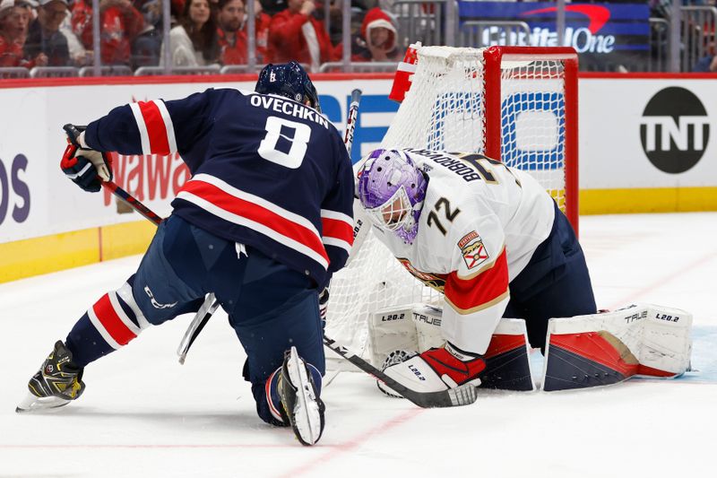 Nov 8, 2023; Washington, District of Columbia, USA; Florida Panthers goaltender Sergei Bobrovsky (72) covers the puck in front of Washington Capitals left wing Alex Ovechkin (8) in the third period at Capital One Arena. Mandatory Credit: Geoff Burke-USA TODAY Sports