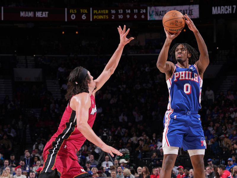 PHILADELPHIA, PA - FEBRUARY 14: Tyrese Maxey #0 of the Philadelphia 76ers shoots the ball during the game against the Miami Heat on February 14, 2024 at the Wells Fargo Center in Philadelphia, Pennsylvania NOTE TO USER: User expressly acknowledges and agrees that, by downloading and/or using this Photograph, user is consenting to the terms and conditions of the Getty Images License Agreement. Mandatory Copyright Notice: Copyright 2024 NBAE (Photo by Jesse D. Garrabrant/NBAE via Getty Images)