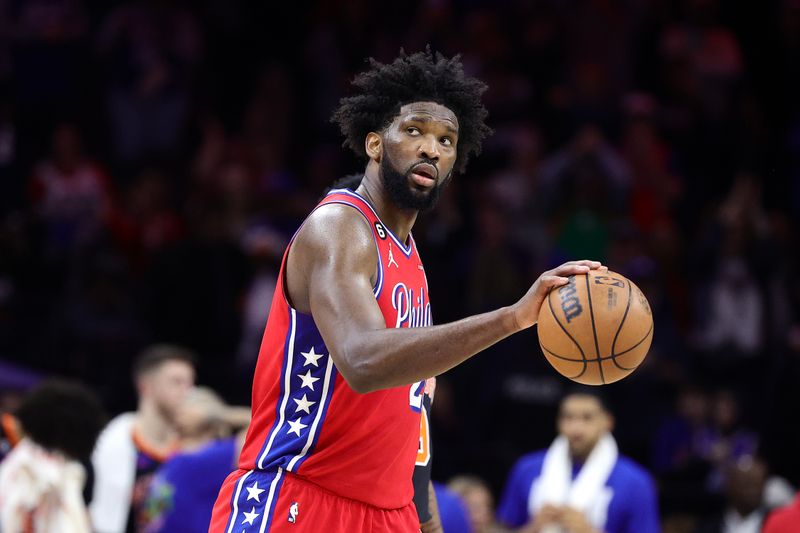 PHILADELPHIA, PENNSYLVANIA - FEBRUARY 10: Joel Embiid #21 of the Philadelphia 76ers dribbles during the fourth quarter against the New York Knicks at Wells Fargo Center on February 10, 2023 in Philadelphia, Pennsylvania. NOTE TO USER: User expressly acknowledges and agrees that, by downloading and or using this photograph, User is consenting to the terms and conditions of the Getty Images License Agreement. (Photo by Tim Nwachukwu/Getty Images)