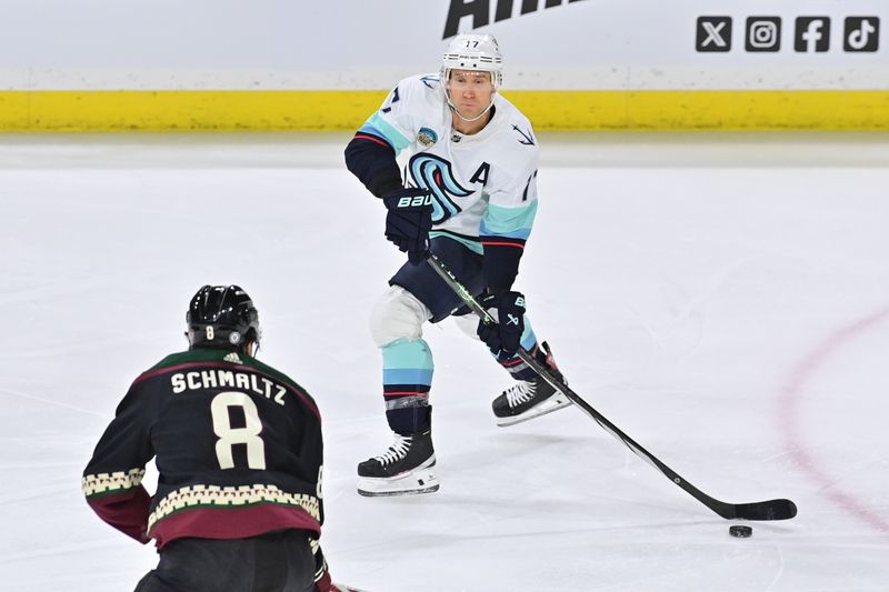 Nov 7, 2023; Tempe, Arizona, USA; Seattle Kraken center Jaden Schwartz (17) looks to pass as Arizona Coyotes center Nick Schmaltz (8) defends in the first period at Mullett Arena. Mandatory Credit: Matt Kartozian-USA TODAY Sports