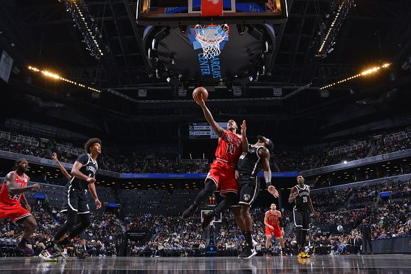 BROOKLYN, NY - NOVEMBER 26: DeMar DeRozan #11 of the Chicago Bulls drives to the basket during the game against the Brooklyn Nets on November 26, 2023 at Barclays Center in Brooklyn, New York. NOTE TO USER: User expressly acknowledges and agrees that, by downloading and or using this Photograph, user is consenting to the terms and conditions of the Getty Images License Agreement. Mandatory Copyright Notice: Copyright 2023 NBAE (Photo by Jesse D. Garrabrant/NBAE via Getty Images)