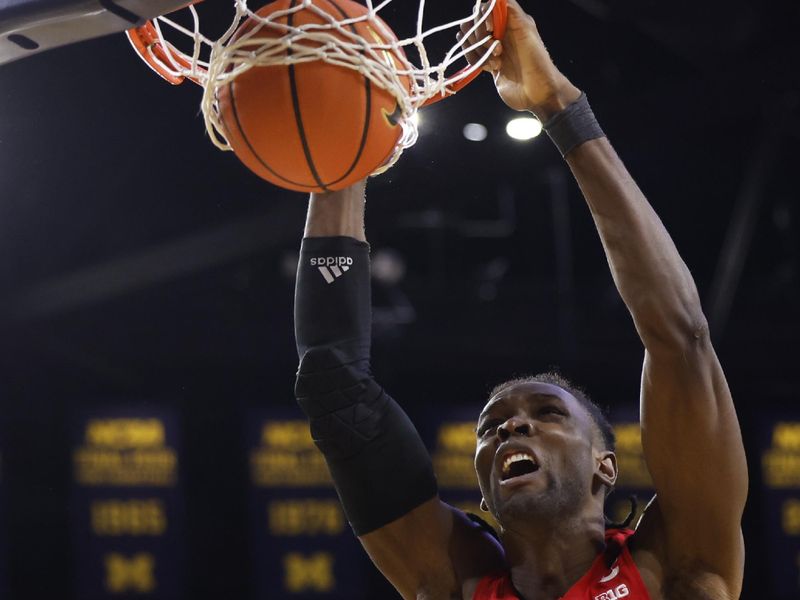 Feb 3, 2024; Ann Arbor, Michigan, USA;  Rutgers Scarlet Knights center Clifford Omoruyi (11) dunks in the second half against the Michigan Wolverines at Crisler Center. Mandatory Credit: Rick Osentoski-USA TODAY Sports