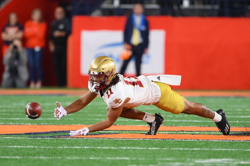 Nov 3, 2023; Syracuse, New York, USA; Boston College Eagles wide receiver Lewis Bond (11) attempts to catch the ball against the Syracuse Orange during the first half at the JMA Wireless Dome. Mandatory Credit: Rich Barnes-USA TODAY Sports