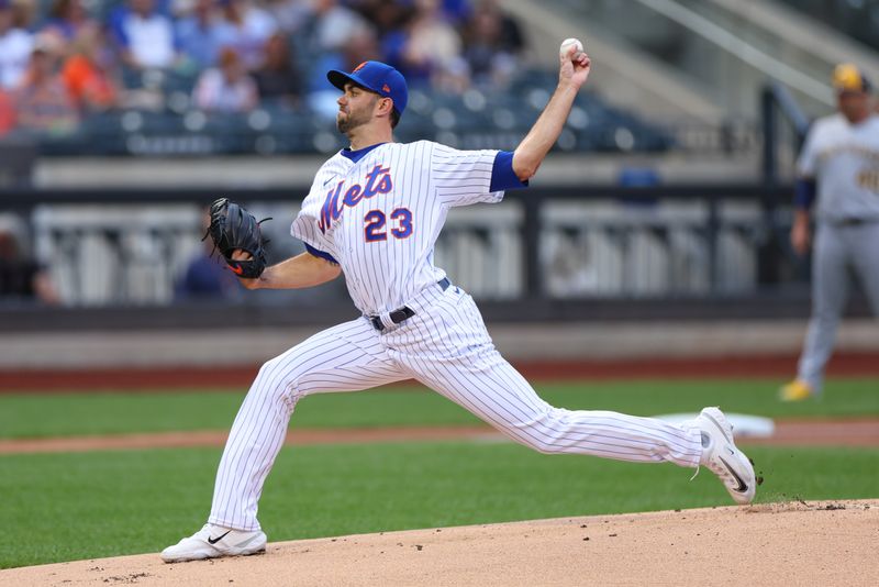 Jun 27, 2023; New York City, New York, USA; New York Mets starting pitcher David Peterson (23) delivers a pitch during the first inning against the Milwaukee Brewers at Citi Field. Mandatory Credit: Vincent Carchietta-USA TODAY Sports