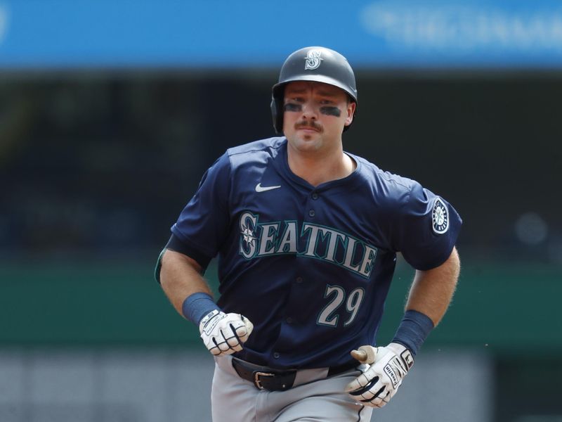 Aug 18, 2024; Pittsburgh, Pennsylvania, USA;  Seattle Mariners catcher Cal Raleigh (29) circles the bases on a two run home run against the Pittsburgh Pirates during the first inning at PNC Park. Mandatory Credit: Charles LeClaire-USA TODAY Sports