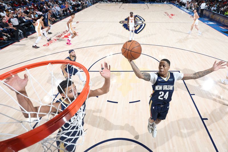 CHICAGO, IL - NOVEMBER 3: Jordan Hawkins #24 of the New Orleans Pelicans rebounds the ball during the game against the Atlanta Hawks on November 3, 2024 at United Center in Chicago, Illinois. NOTE TO USER: User expressly acknowledges and agrees that, by downloading and or using this photograph, User is consenting to the terms and conditions of the Getty Images License Agreement. Mandatory Copyright Notice: Copyright 2024 NBAE (Photo by Jeff Haynes/NBAE via Getty Images)