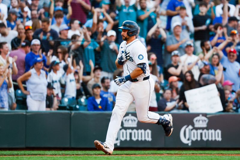Jun 30, 2025; Seattle, Washington, USA; Seattle Mariners catcher Cal Raleigh (29) runs the bases after hitting a solo-home run against the Kansas City Royals during the seventh inning at T-Mobile Park. Mandatory Credit: Joe Nicholson-Imagn Images