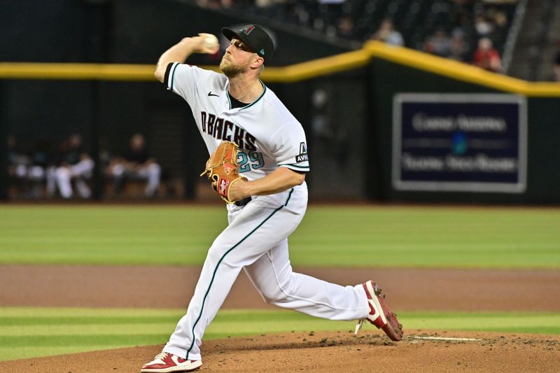 May 10, 2023; Phoenix, Arizona, USA; Arizona Diamondbacks starting pitcher Merrill Kelly (29) throws in the first inning against the Miami Marlins at Chase Field. Mandatory Credit: Matt Kartozian-USA TODAY Sports