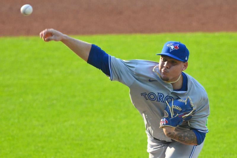 Jun 21, 2024; Cleveland, Ohio, USA; Toronto Blue Jays starting pitcher Yariel Rodriguez (29) delivers a pitch in the first inning against the Cleveland Guardians at Progressive Field. Mandatory Credit: David Richard-USA TODAY Sports