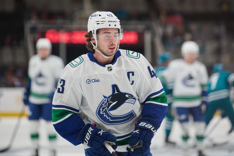 Nov 2, 2024; San Jose, California, USA; Vancouver Canucks defenseman Quinn Hughes (43) warms up on the ice before the game between the Vancouver Canucks and the San Jose Sharks at SAP Center at San Jose. Mandatory Credit: Robert Edwards-Imagn Images