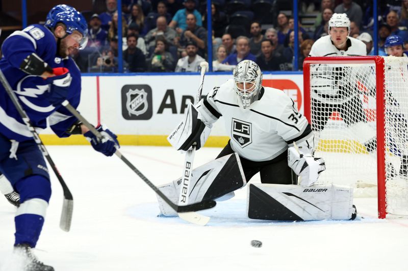 Jan 9, 2024; Tampa, Florida, USA; Los Angeles Kings goaltender Cam Talbot (39) looks ay the puck from Tampa Bay Lightning right wing Nikita Kucherov (86) during the first period at Amalie Arena. Mandatory Credit: Kim Klement Neitzel-USA TODAY Sports