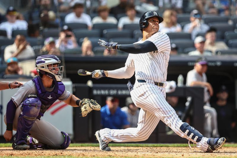 Aug 25, 2024; Bronx, New York, USA;  New York Yankees right fielder Juan Soto (22) hits a solo home run in the seventh inning against the Colorado Rockies at Yankee Stadium. Mandatory Credit: Wendell Cruz-USA TODAY Sports