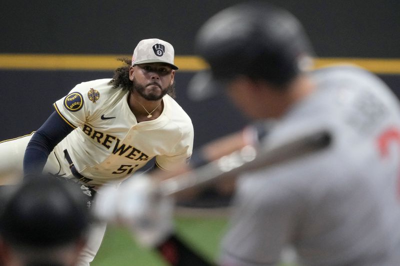 May 18, 2025; Milwaukee, Wisconsin, USA; Milwaukee Brewers pitcher Freddy Peralta (51) delivers a pitch in the first inning against the Minnesota Twins at American Family Field. Mandatory Credit: Michael McLoone-Imagn Images