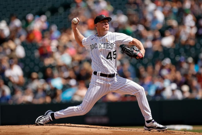 Sep 3, 2023; Denver, Colorado, USA; Colorado Rockies starting pitcher Chase Anderson (45) pitches in the first inning against the Toronto Blue Jays at Coors Field. Mandatory Credit: Isaiah J. Downing-USA TODAY Sports