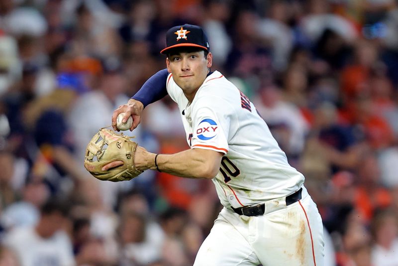 Aug 18, 2024; Houston, Texas, USA; Houston Astros third baseman Shay Whitcomb (10) throws a fielded ball to first base for an out against the Chicago White Sox during the sixth inning at Minute Maid Park. Mandatory Credit: Erik Williams-USA TODAY Sports