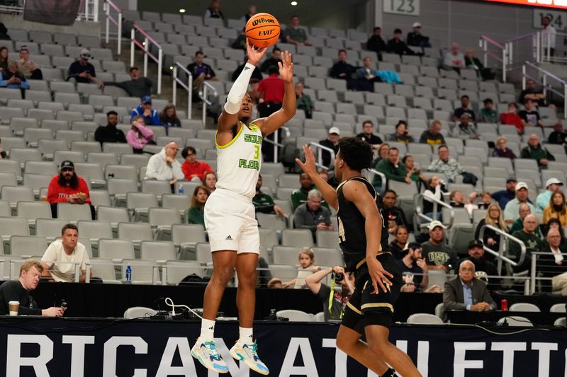 Mar 16, 2024; Fort Worth, TX, USA; South Florida Bulls guard Chris Youngblood (3) attempts a three point basket against UAB Blazers guard Efrem Johnson (24) during the first half at Dickies Arena. Mandatory Credit: Chris Jones-USA TODAY Sports