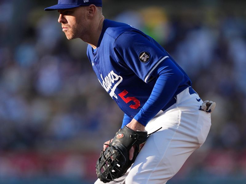 Mar 23, 2025; Los Angeles, California, USA;  Los Angeles Dodgers first base Freddie Freeman (5) during the game against the Los Angeles Angels at Dodger Stadium. Mandatory Credit: Kirby Lee-Imagn Images