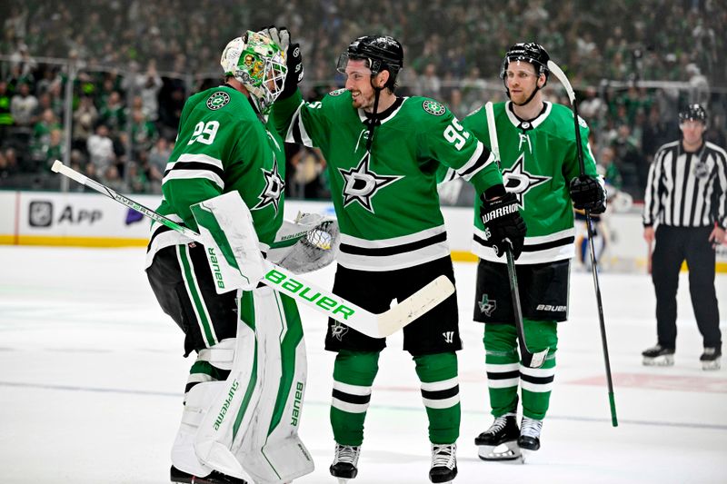 Apr 17, 2024; Dallas, Texas, USA; Dallas Stars goaltender Jake Oettinger (29) and center Matt Duchene (95) and center Radek Faksa (12) celebrates after the Stars defeat the St. Louis Blues during the overtime shootout at the American Airlines Center. Mandatory Credit: Jerome Miron-USA TODAY Sports