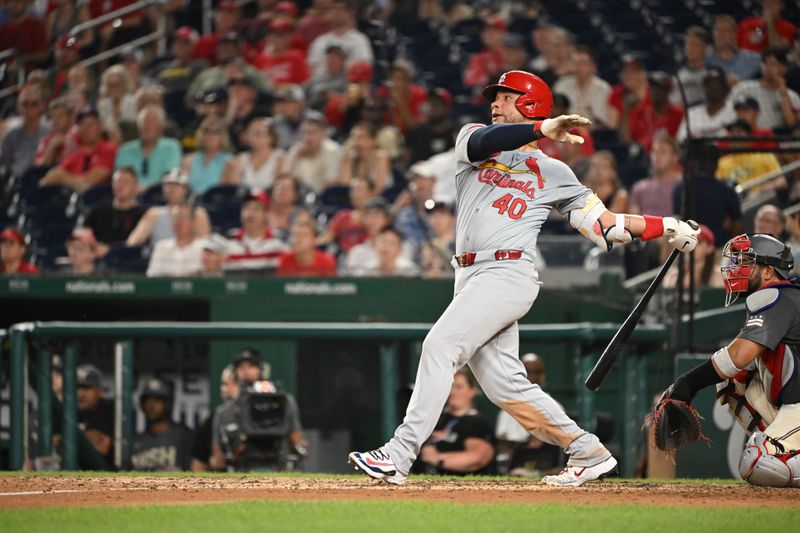 Jul 5, 2024; Washington, District of Columbia, USA; St. Louis Cardinals catcher Willson Contreras (40) watches the ball fly over the wall for a home run against the Washington Nationals during the ninth inning at Nationals Park. Mandatory Credit: Rafael Suanes-USA TODAY Sports