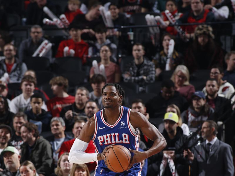 PORTLAND, OR - JANUARY 29: Danuel House Jr. #25 of the Philadelphia 76ers looks to pass the ball during the game against the Portland Trail Blazers on January 29, 2024 at the Moda Center Arena in Portland, Oregon. NOTE TO USER: User expressly acknowledges and agrees that, by downloading and or using this photograph, user is consenting to the terms and conditions of the Getty Images License Agreement. Mandatory Copyright Notice: Copyright 2024 NBAE (Photo by Cameron Browne/NBAE via Getty Images)