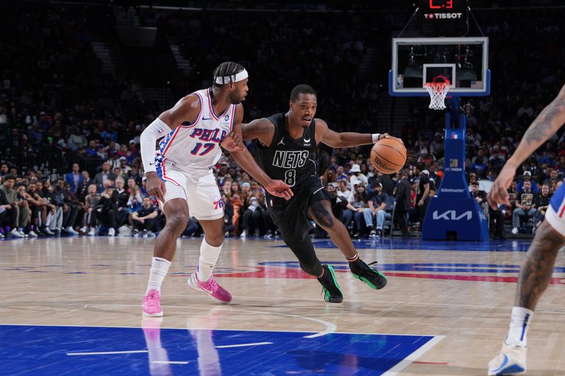 PHILADELPHIA, PA - APRIL 14: Lonnie Walker IV #8 of the Brooklyn Nets dribbles the ball during the game against the Philadelphia 76ers on April 14, 2024 at the Wells Fargo Center in Philadelphia, Pennsylvania NOTE TO USER: User expressly acknowledges and agrees that, by downloading and/or using this Photograph, user is consenting to the terms and conditions of the Getty Images License Agreement. Mandatory Copyright Notice: Copyright 2024 NBAE (Photo by Jesse D. Garrabrant/NBAE via Getty Images)