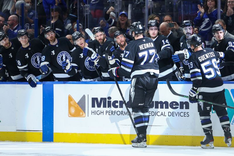 Nov 16, 2024; Tampa, Florida, USA;  Tampa Bay Lightning defenseman Victor Hedman (77) celebrates after scoring a goal against the New Jersey Devils in the third period at Amalie Arena. Mandatory Credit: Nathan Ray Seebeck-Imagn Images