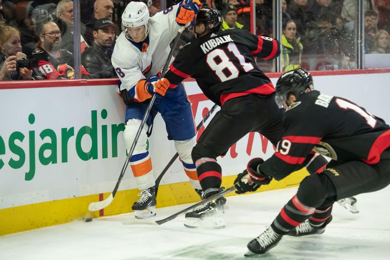 Nov 24, 2023; Ottawa, Ontario, CAN; New York Islanders defenseman Noah Dobson Is taken off the puck by Ottawa Senators left wing Dominik Kubalik (81) in the first period at the Canadian Tire Centre. Mandatory Credit: Marc DesRosiers-USA TODAY Sports