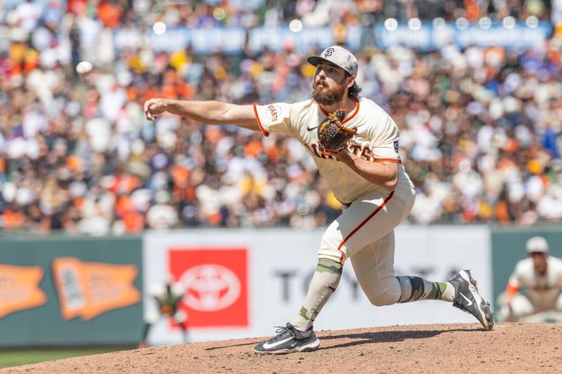 May 18, 2025; San Francisco, California, USA; San Francisco Giants pitcher Ryan Walker (74) throws a pitch during the ninth inning against the Oakland Athletics at Oracle Park. Mandatory Credit: Bob Kupbens-Imagn Images