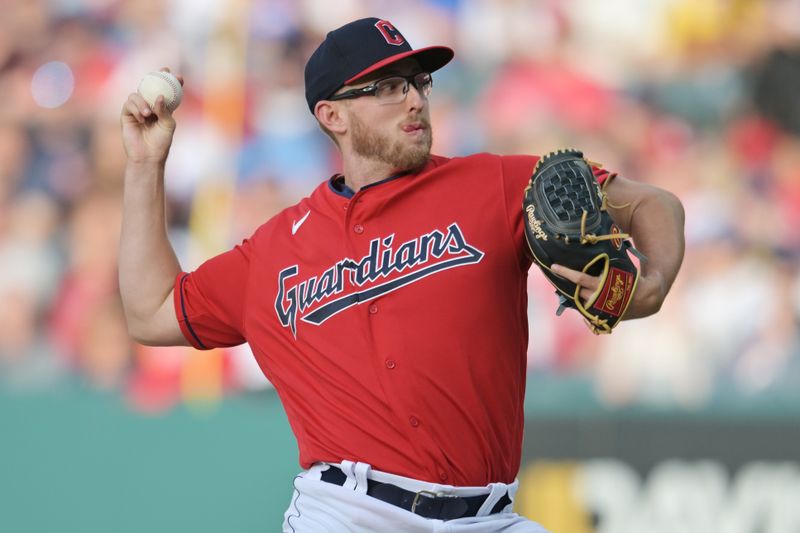 May 27, 2023; Cleveland, Ohio, USA; Cleveland Guardians starting pitcher Tanner Bibee (61) throws a pitch during the first inning against the St. Louis Cardinals at Progressive Field. Mandatory Credit: Ken Blaze-USA TODAY Sports