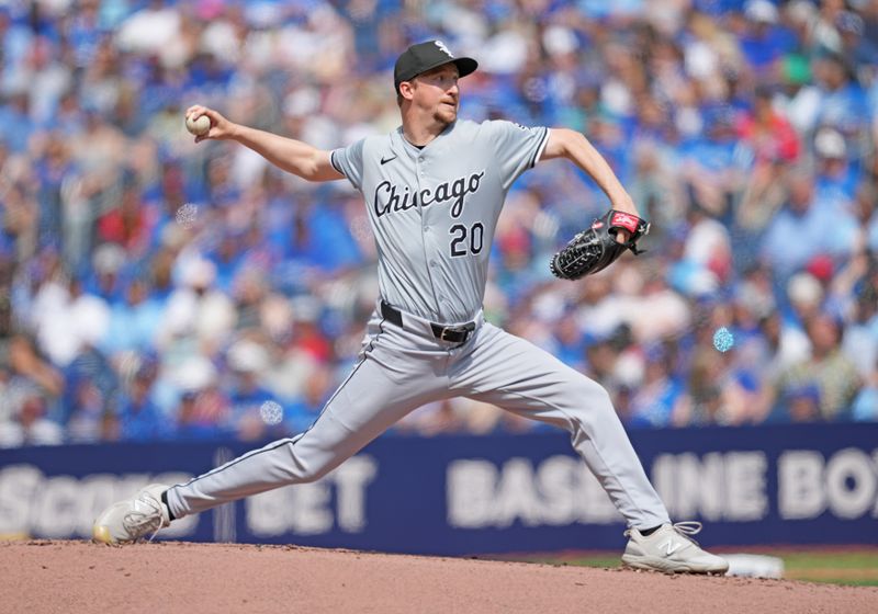 May 20, 2024; Toronto, Ontario, CAN; Chicago White Sox starting pitcher Erick Fedde (20) throws a pitch against the Toronto Blue Jays during the first inning at Rogers Centre. Mandatory Credit: Nick Turchiaro-USA TODAY Sports