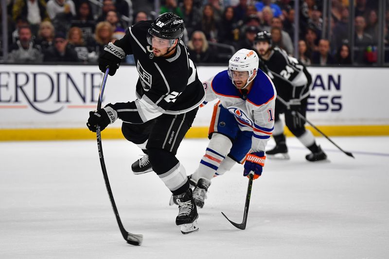 Apr 29, 2023; Los Angeles, California, USA; Los Angeles Kings left wing Kevin Fiala (22) shoots on goal ahead of Edmonton Oilers center Derek Ryan (10) during the second period in game six of the first round of the 2023 Stanley Cup Playoffs at Crypto.com Arena. Mandatory Credit: Gary A. Vasquez-USA TODAY Sports