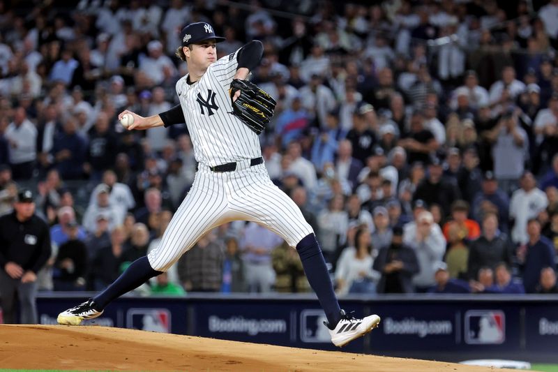 Oct 8, 2025; Bronx, New York, USA; New York Yankees pitcher Cam Schlittler (31) pitches during the first inning against the Toronto Blue Jays during game four of the ALDS round for the 2025 MLB playoffs at Yankee Stadium. Mandatory Credit: Brad Penner-Imagn Images