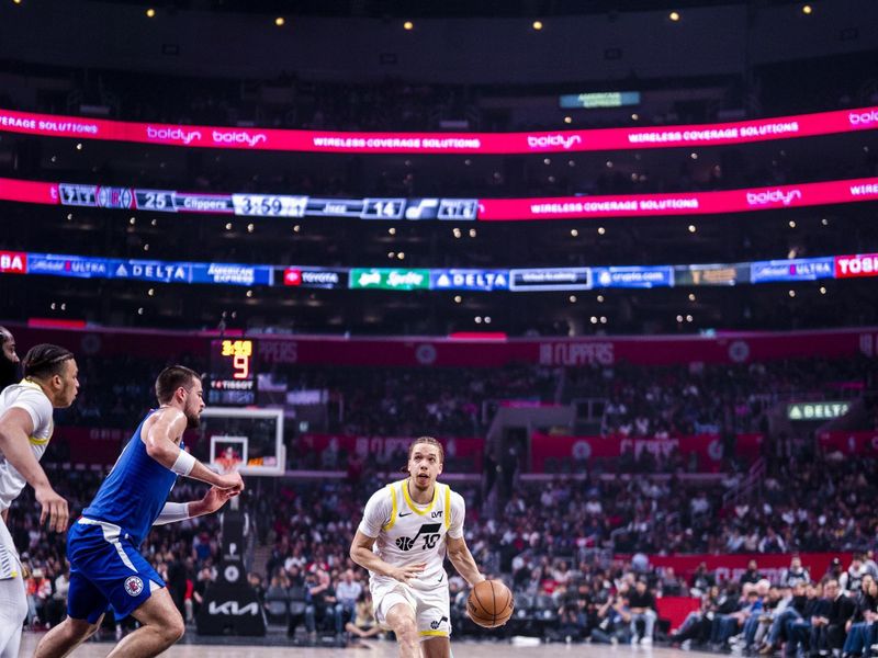 LOS ANGELES, CA - APRIL 12: Jason Preston #10 of the Utah Jazz drives to the basket during the game against the LA Clippers on April 12, 2024 at Crypto.Com Arena in Los Angeles, California. NOTE TO USER: User expressly acknowledges and agrees that, by downloading and/or using this Photograph, user is consenting to the terms and conditions of the Getty Images License Agreement. Mandatory Copyright Notice: Copyright 2024 NBAE (Photo by Tyler Ross/NBAE via Getty Images)